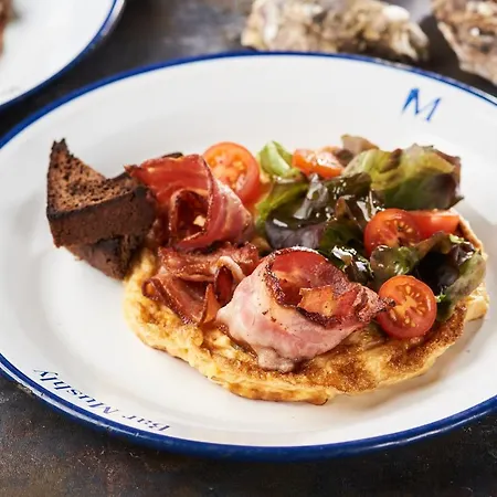 Oysters & Bubbles Gastro Hotel. Rynok Square * Lviv