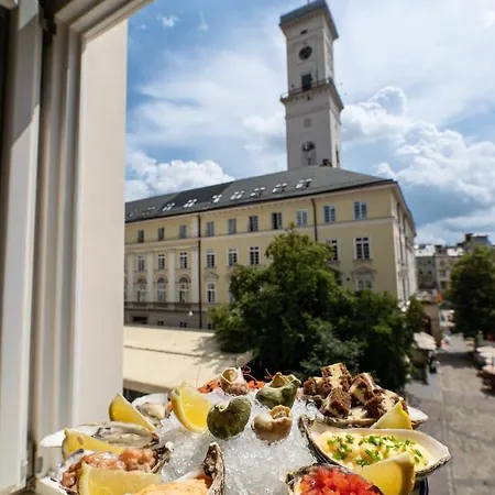 Oysters & Bubbles Gastro Hotel. Rynok Square